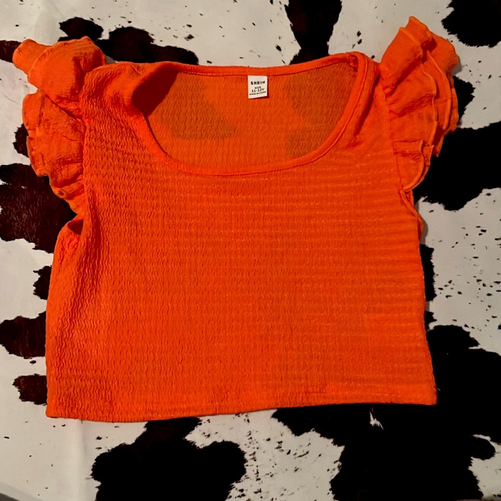 This is a short sleeve ruffled top from Shein